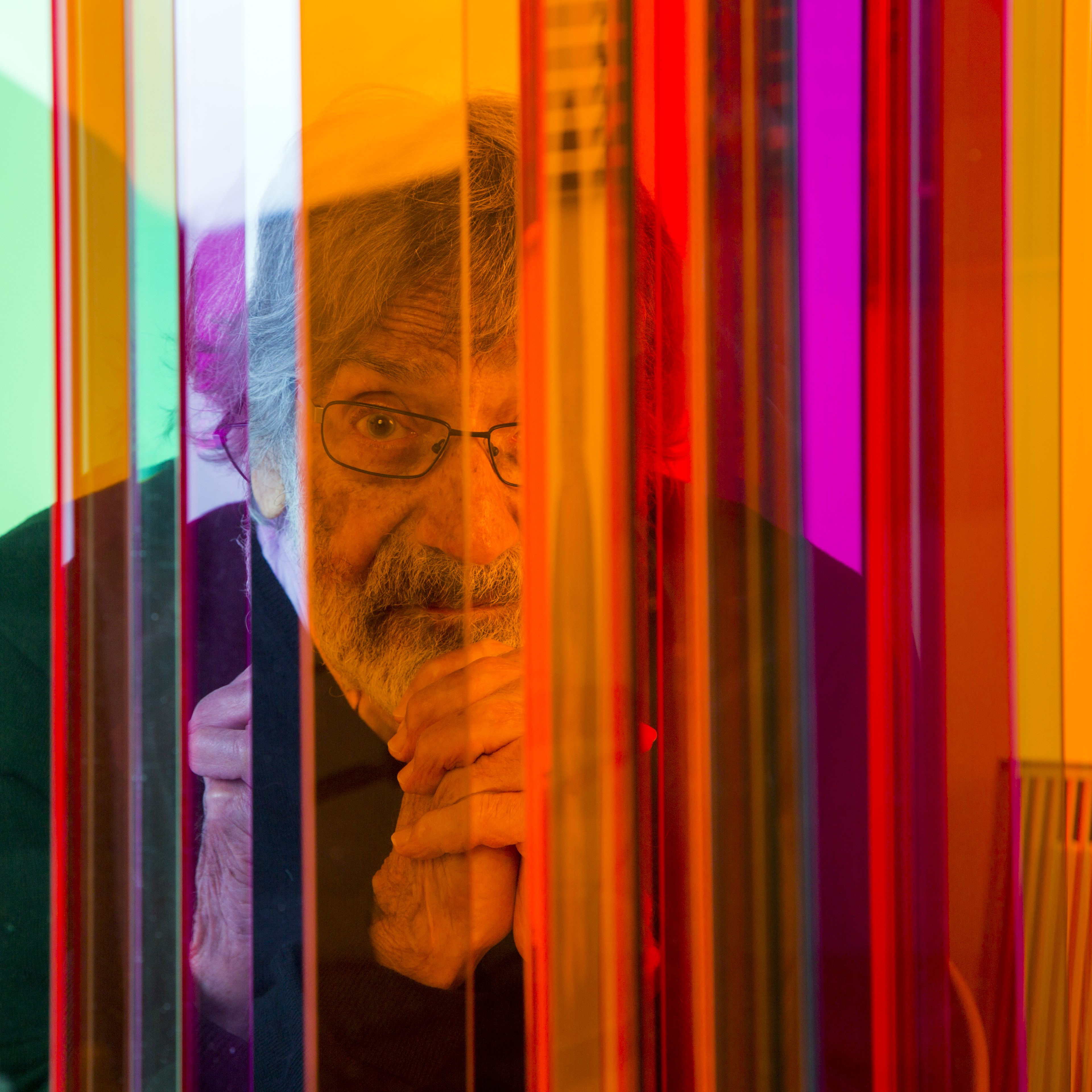 Carlos Cruz-Diez behind a Transchromie in his artist's studio, Paris, France, 2017. © Carlos Cruz-Diez / Bridgeman Images 2023